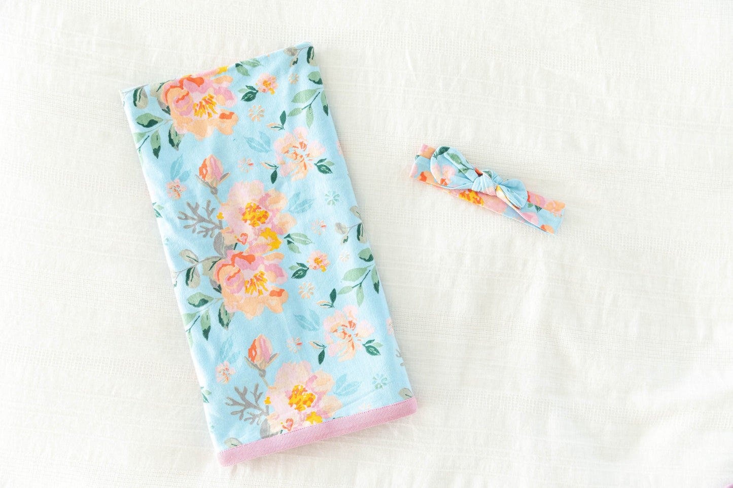 Jade is a colorful flowered print. Swaddle your newborn in Jade for a heavenly look. 