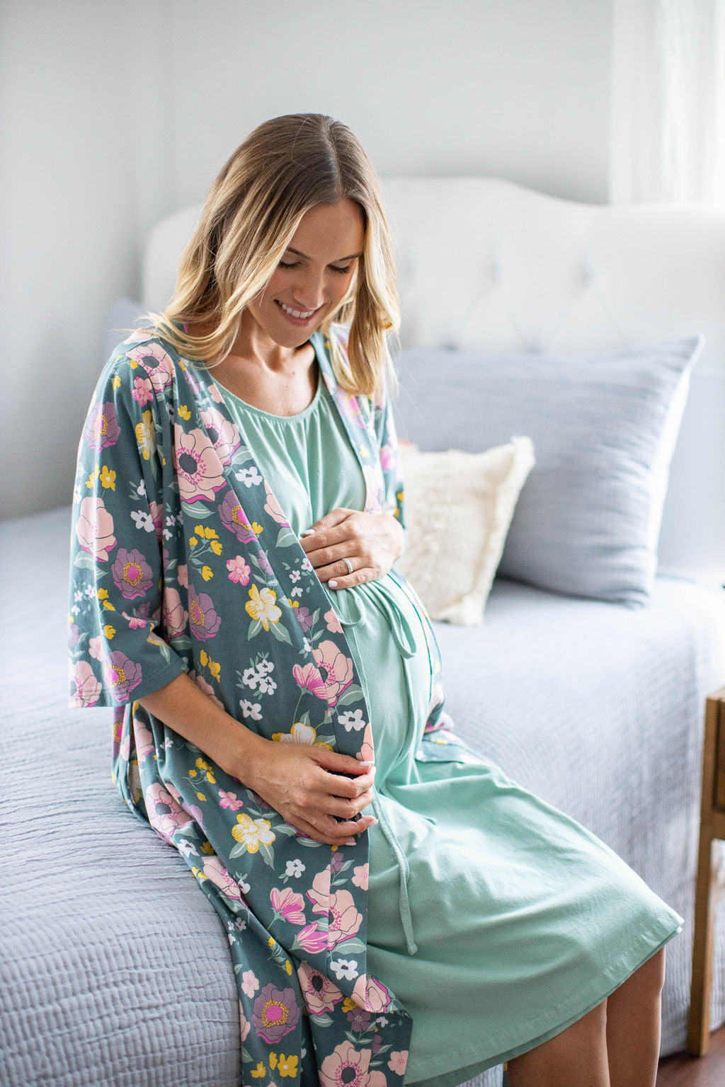 Charlotte maternity robe and Sage labor gown. Perfect outfit for labor and delivery. Pink, yellow, and white flowers against a deep green background with a Sage labor gown to coordinate.